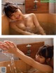 A woman in a bathtub with water coming out of her hands.